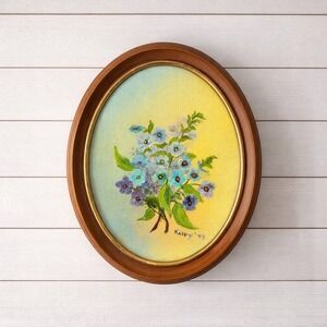 Gorgeous Vintage Floral Artwork in Oval frame.